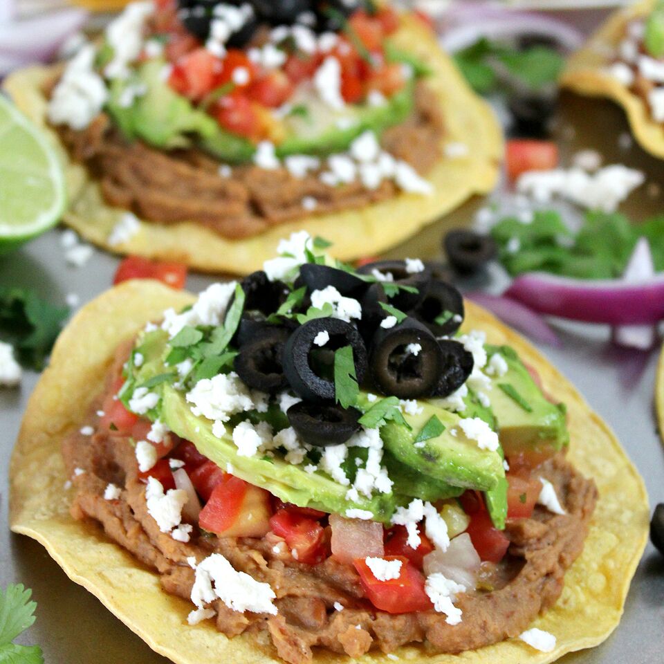 https://www.livingwellspendingless.com/wp-content/uploads/2017/06/Quick-Easy-Tostadas-SQUARE-IMAGE-ONLY.jpeg